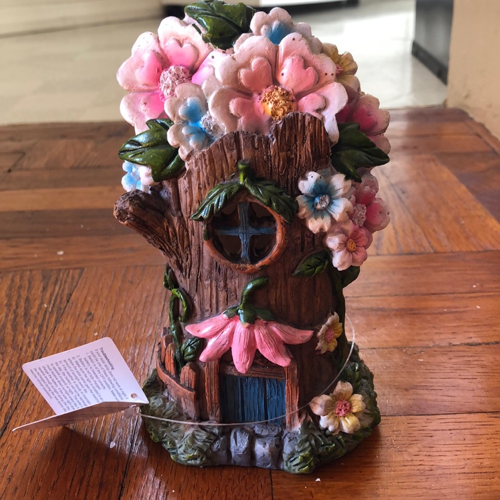 Solar fairy flower house tree trunk